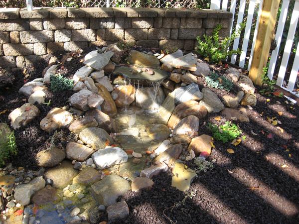 water feature in rock garden