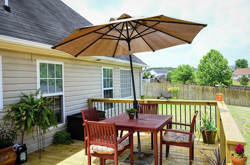 corner of new deck with patio set