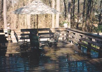 wet deck with patio set and umbrella