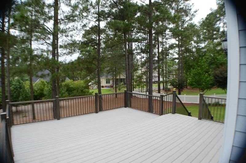 new gray deck with dark gray railing