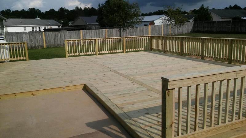 large deck with step up from patio