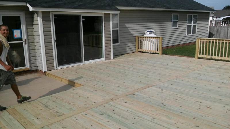 newly constructed large deck with steps off side