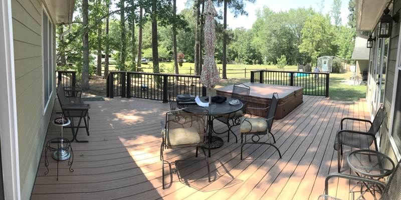 large deck with jacuzzi
