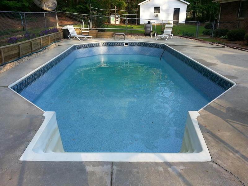 inground pool being filled after repairs