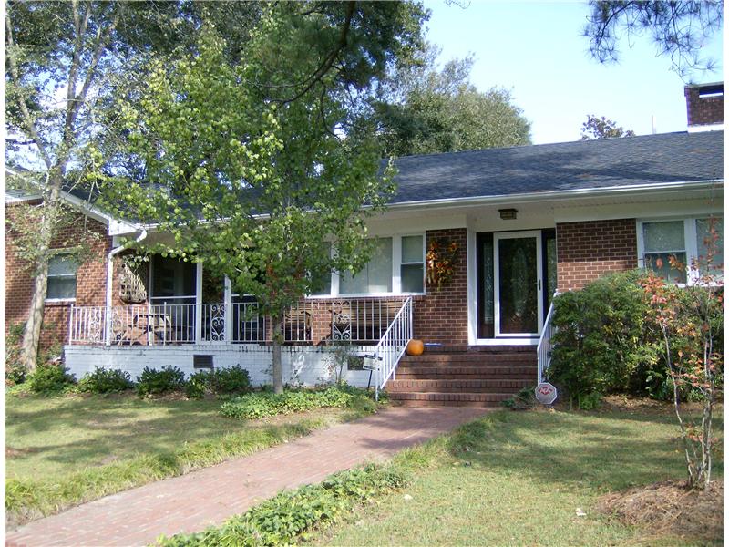 front porch of brick house before updates