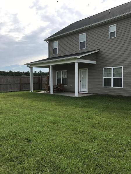 side view of covered patio on back of house