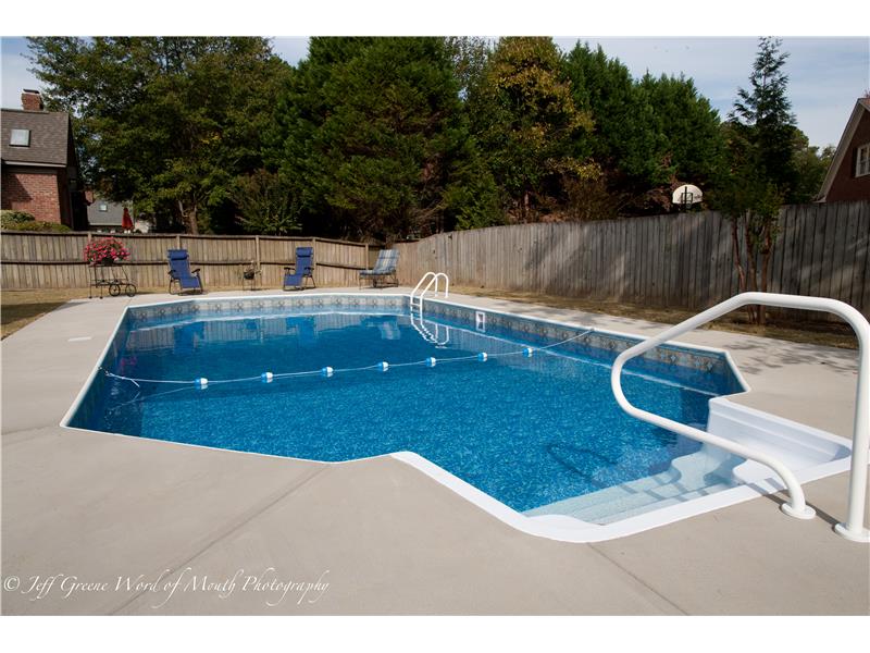 stairs and railing leading into pool