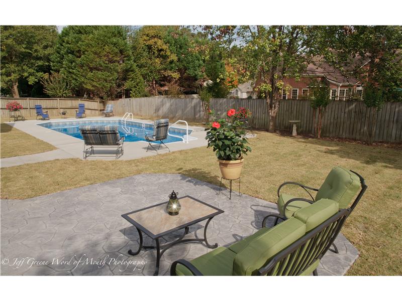 seating area in yard off pool area
