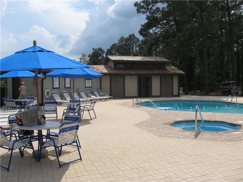 brick patio with inground pool and jacuzzi