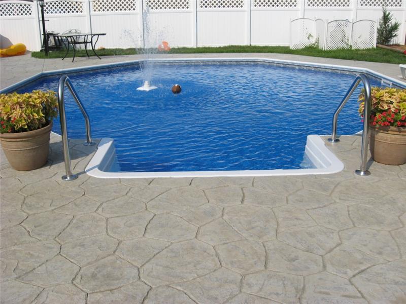 stairs leading into octagon inground pool