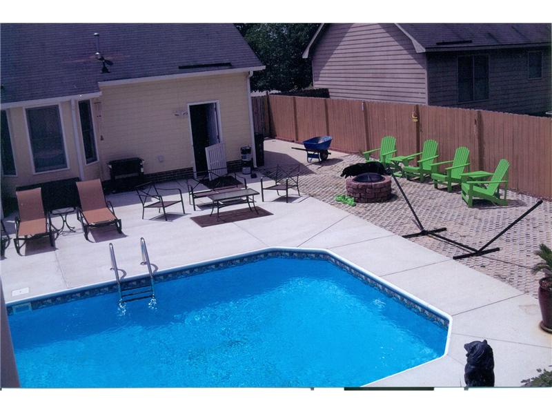 inground pool with patio surround