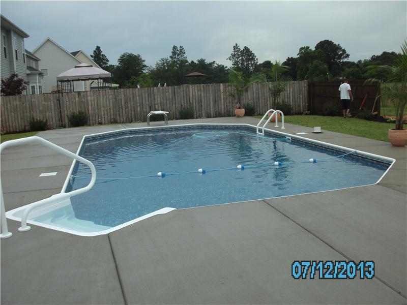 stairs leading into inground pool