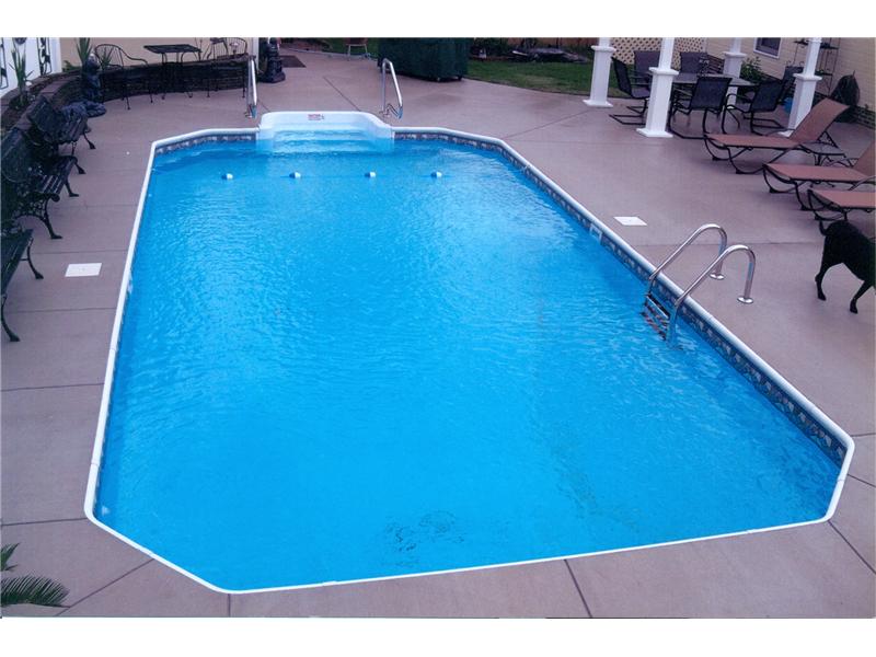 ingound pool with cement surround