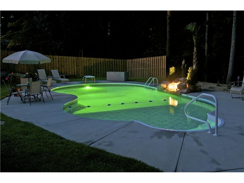 freeform pool with underwater lights