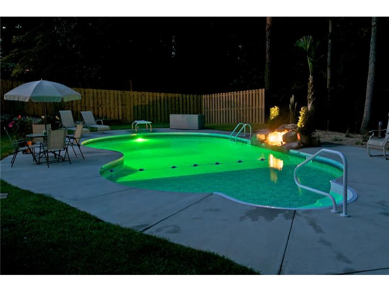inground freeform pool with underwater lights