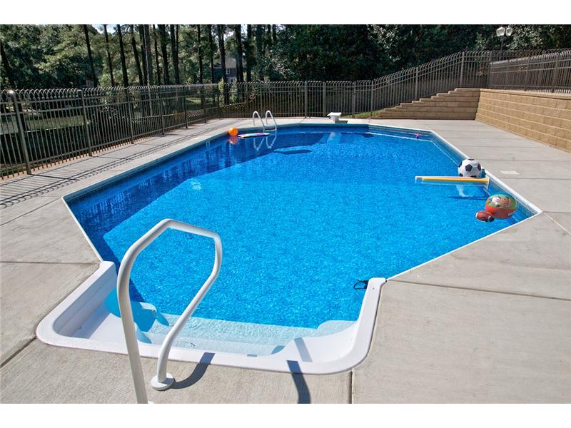 pool with floating balls and toys