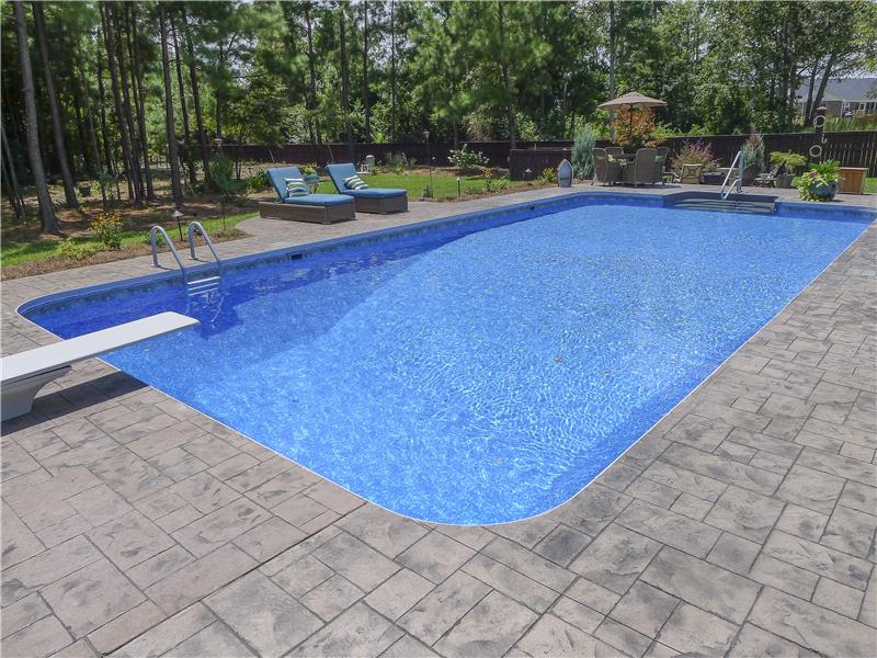 diving board at end of rectagular pool