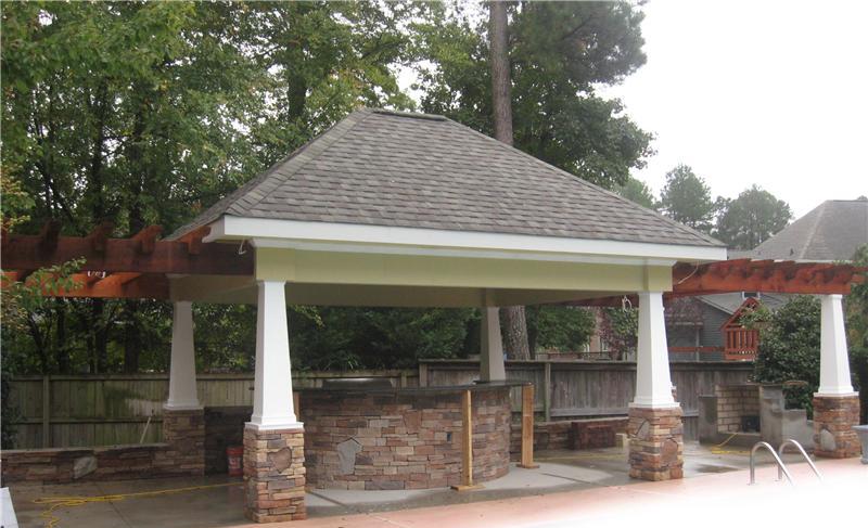 covered area with outdoor kitchen under construction