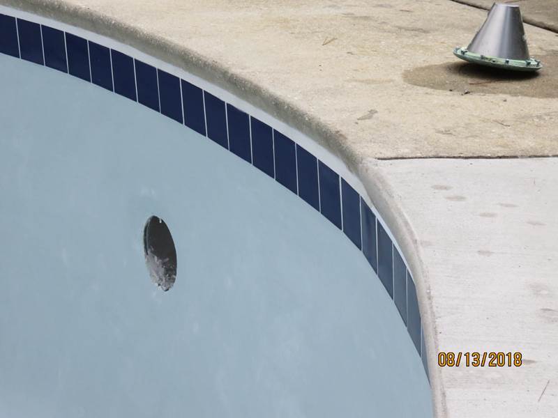 wall of inground pool after replaster