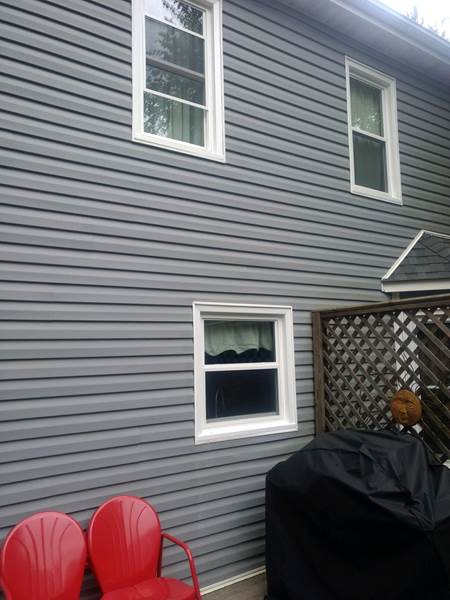 3 small windows on back of house 2 upper 1 lower