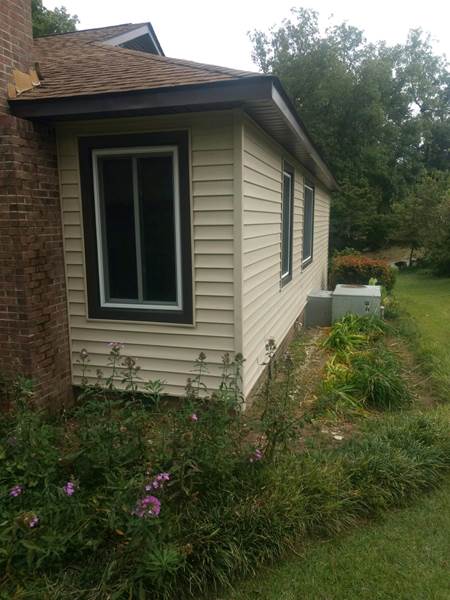 rectangular window on side of house