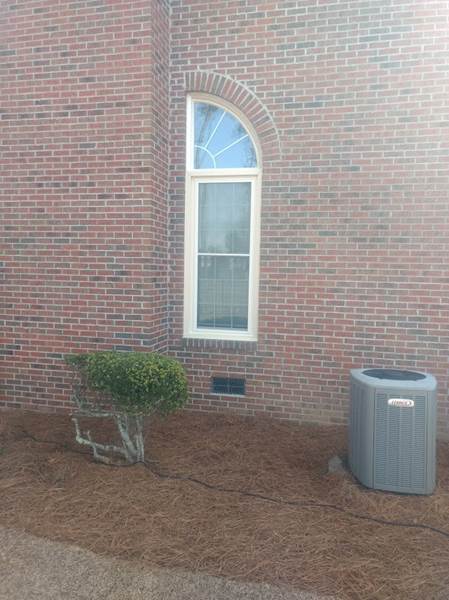 single window with decorative curved corner window on top