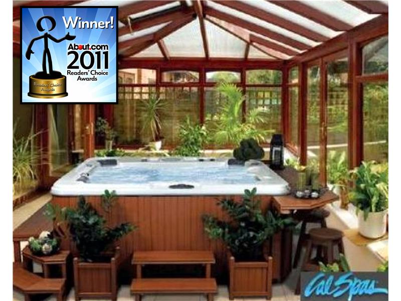 bubbling hot tub under a screened gazebo