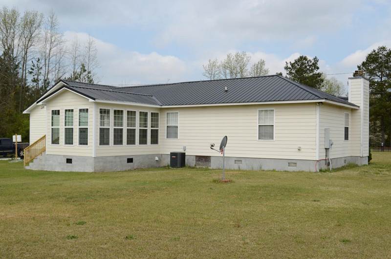 side view of sunroom addtion on back of house