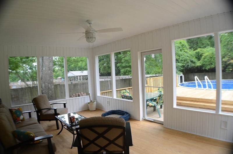 sunroom looking out to deck and pool