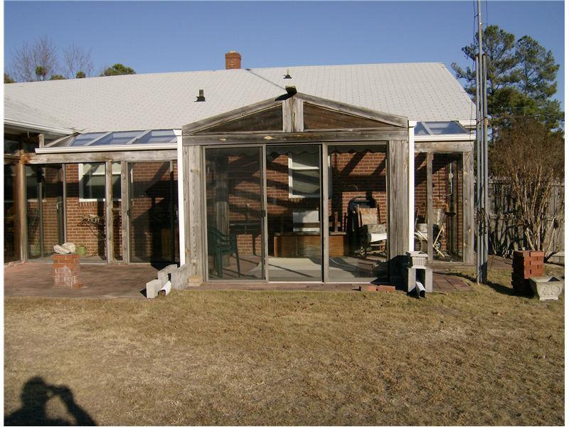 rustic wooden sunroom under construction