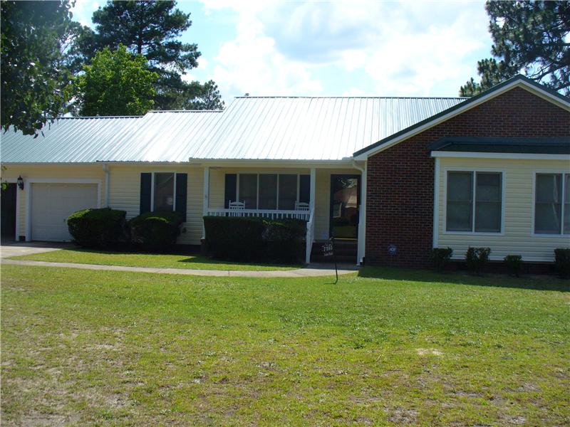 Brick Home with Yellow Vinyl Siding, Fayetteville NC Siding Contractor