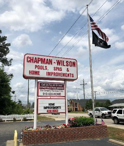 Exterior company signage for Chapman-Wilson pools, spas & home improvements