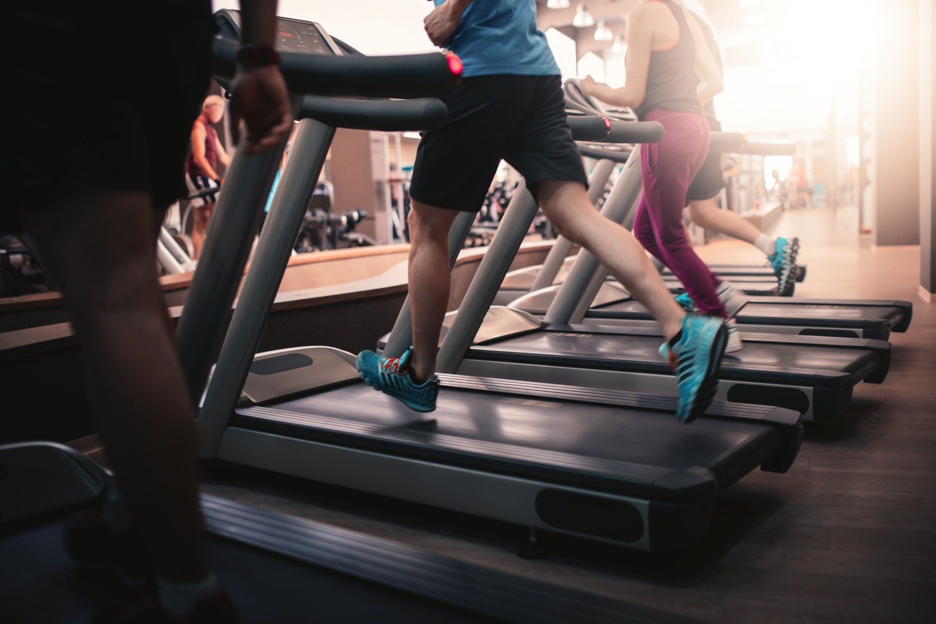 young people running on treadmill
