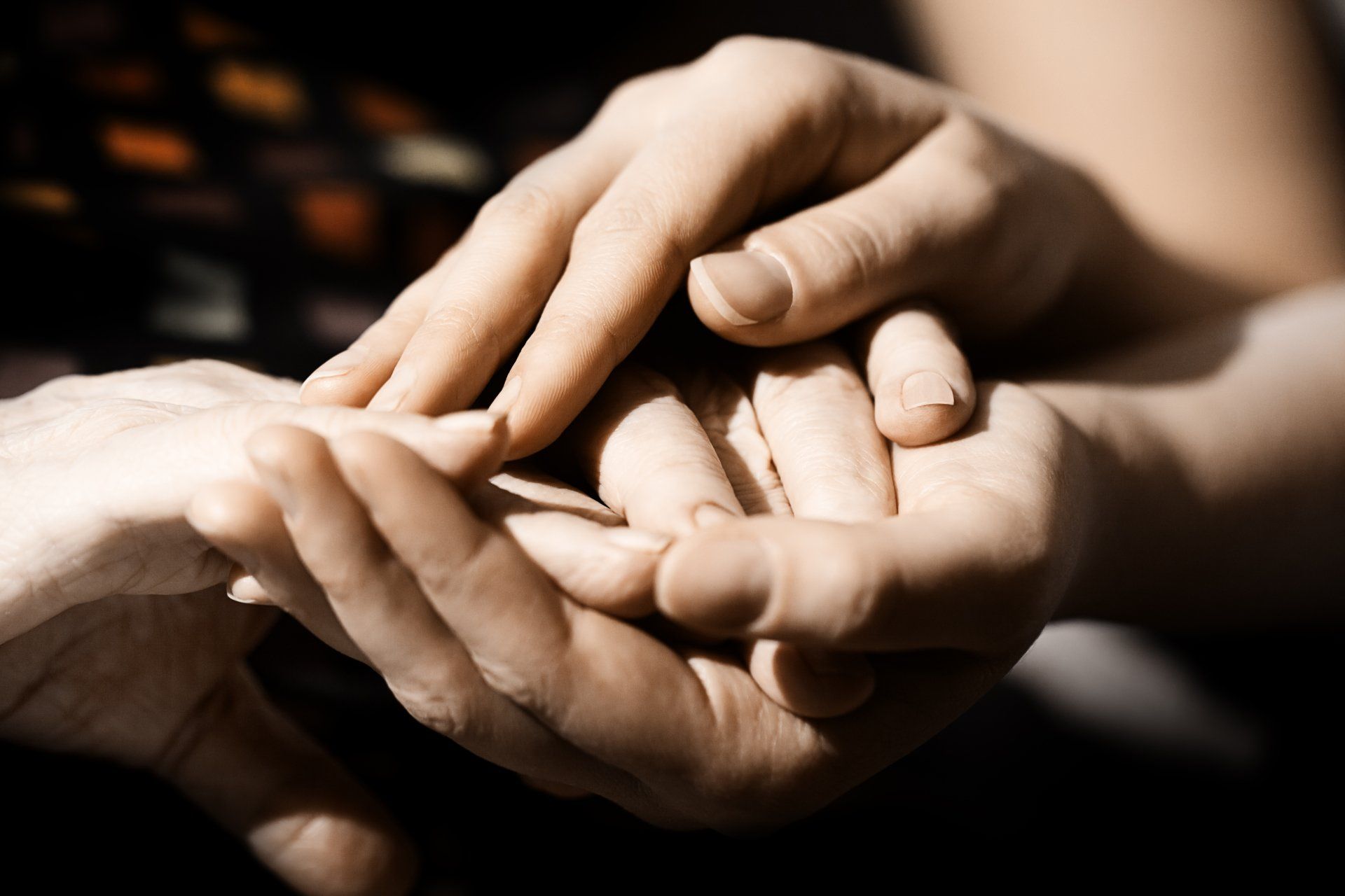 a close up of a person holding another person 's hand