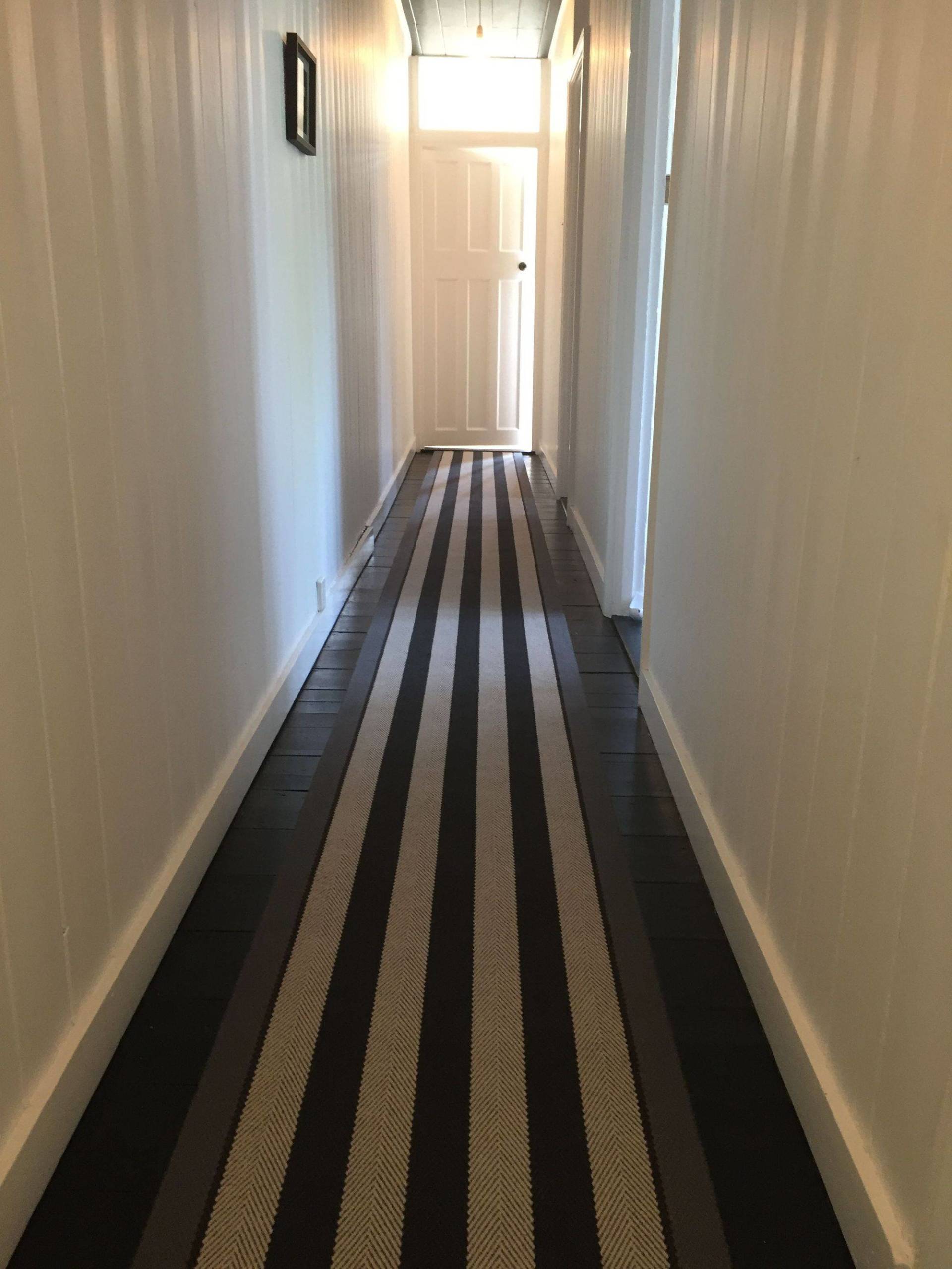classical flooring using carpet runner for hallway