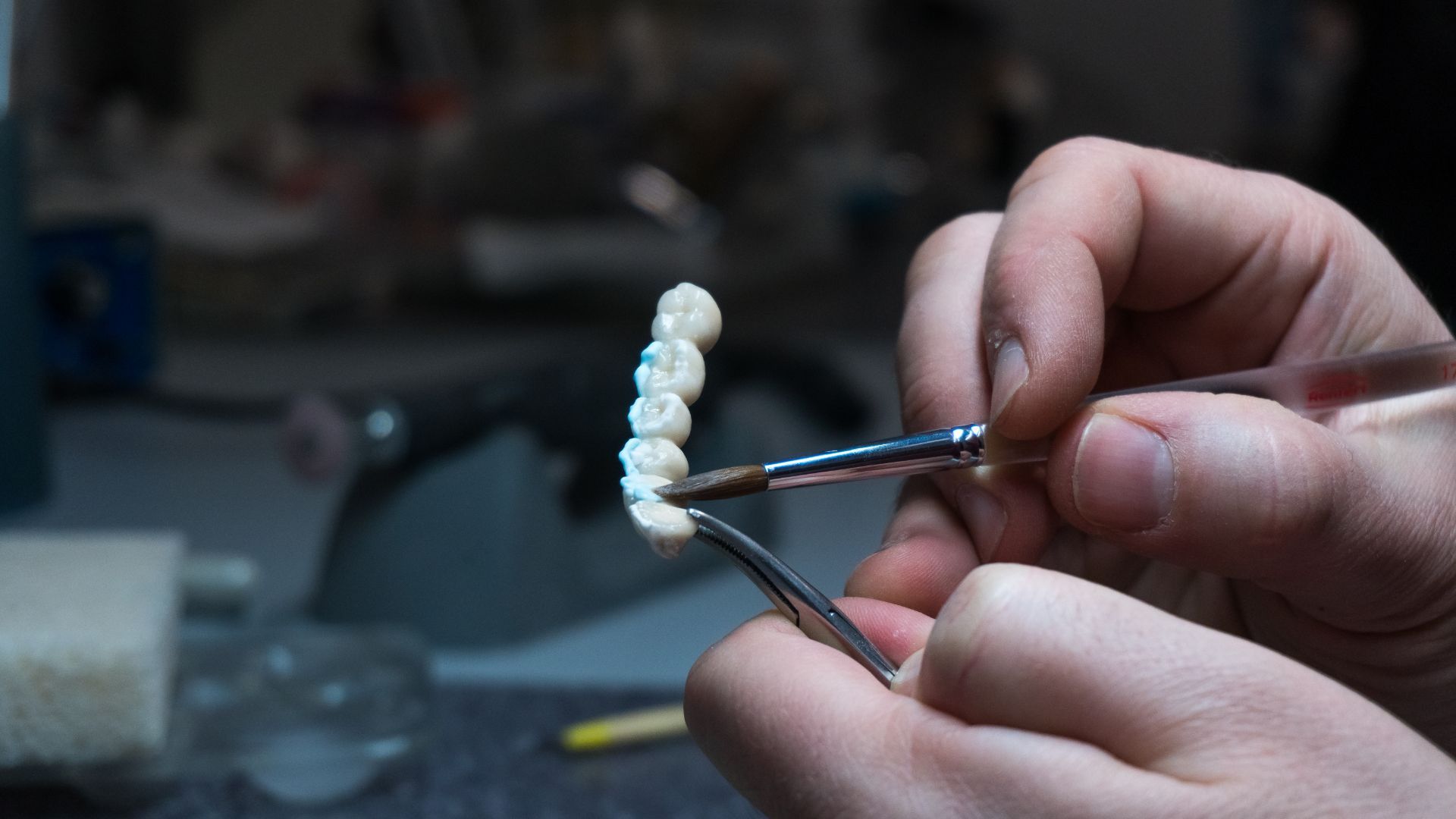 Bridge being prepared by dentist