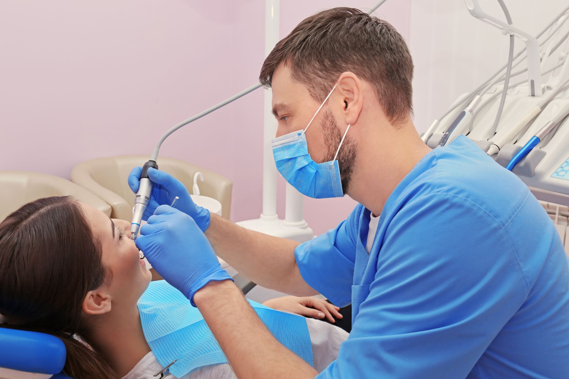 Dentist working on patient