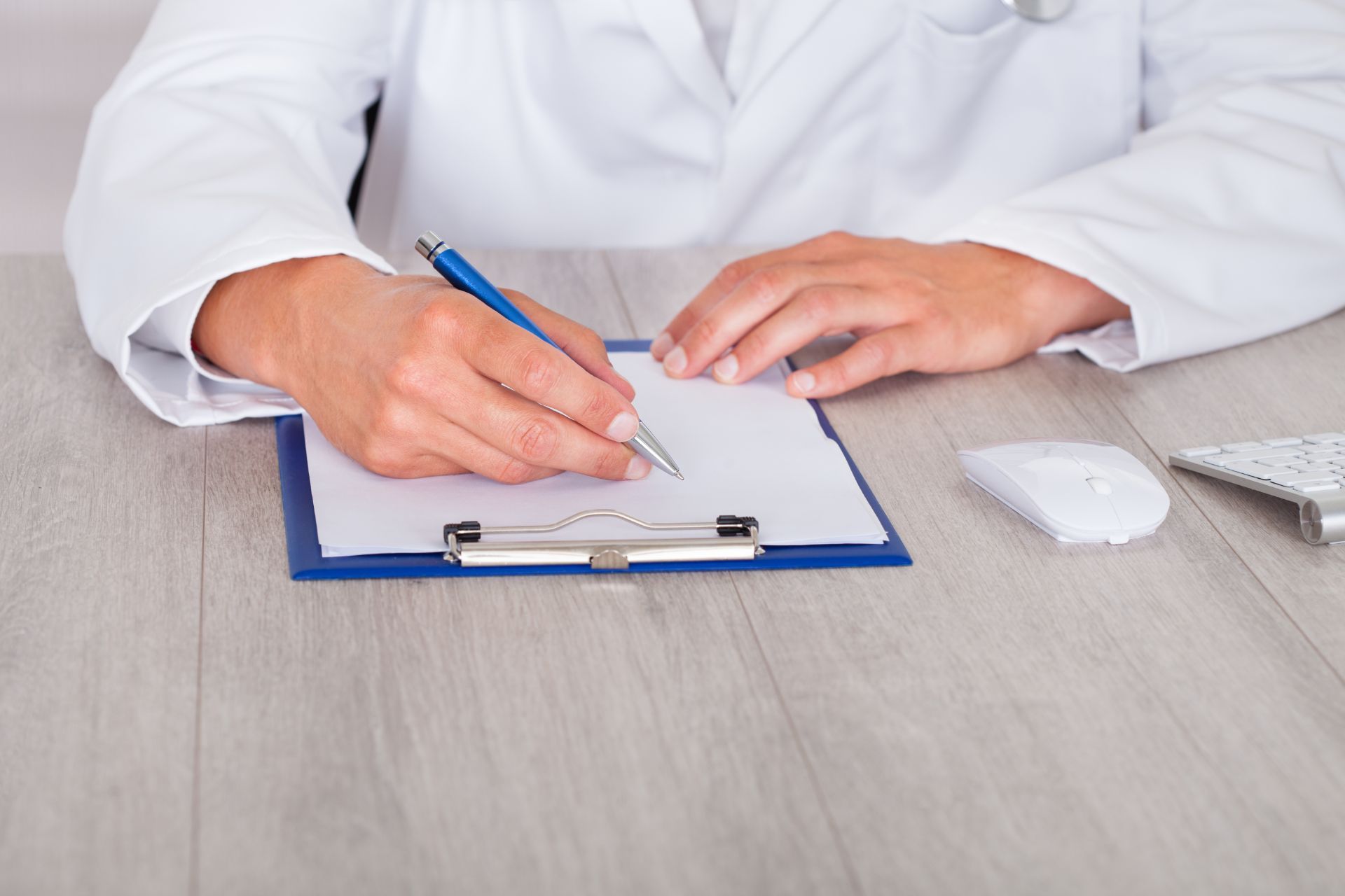 Person filling out paperwork