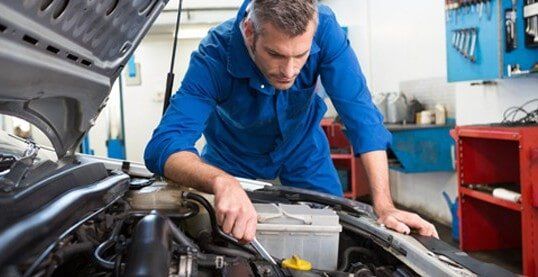 Mechanic Repairing Car Mechanic Repairing Car