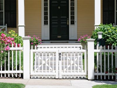 White Fence with Gate Over the Garden — Hickory, NC — Fister Fence of Hickory LLC White Fence with Gate Over the Garden — Hickory, NC — Fister Fence of Hickory LLC
