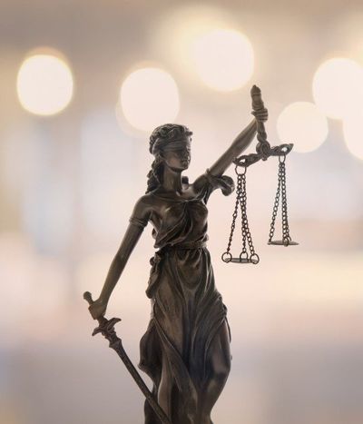 Law Book and Judge Gavel — Law Book and Judge Gavel on Wooden Background in San Diego, CA