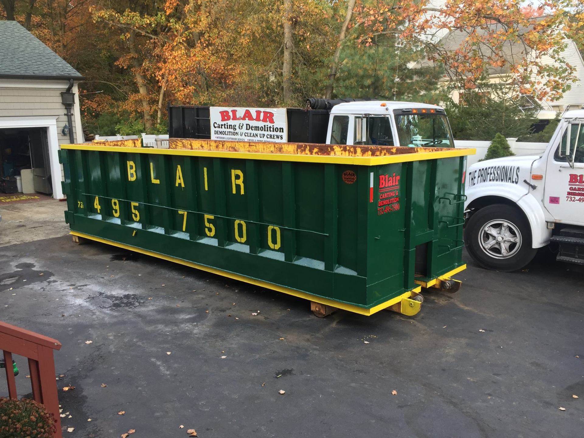 Dumpster Rentals — Dumpster Outside Home in Middletown, NJ