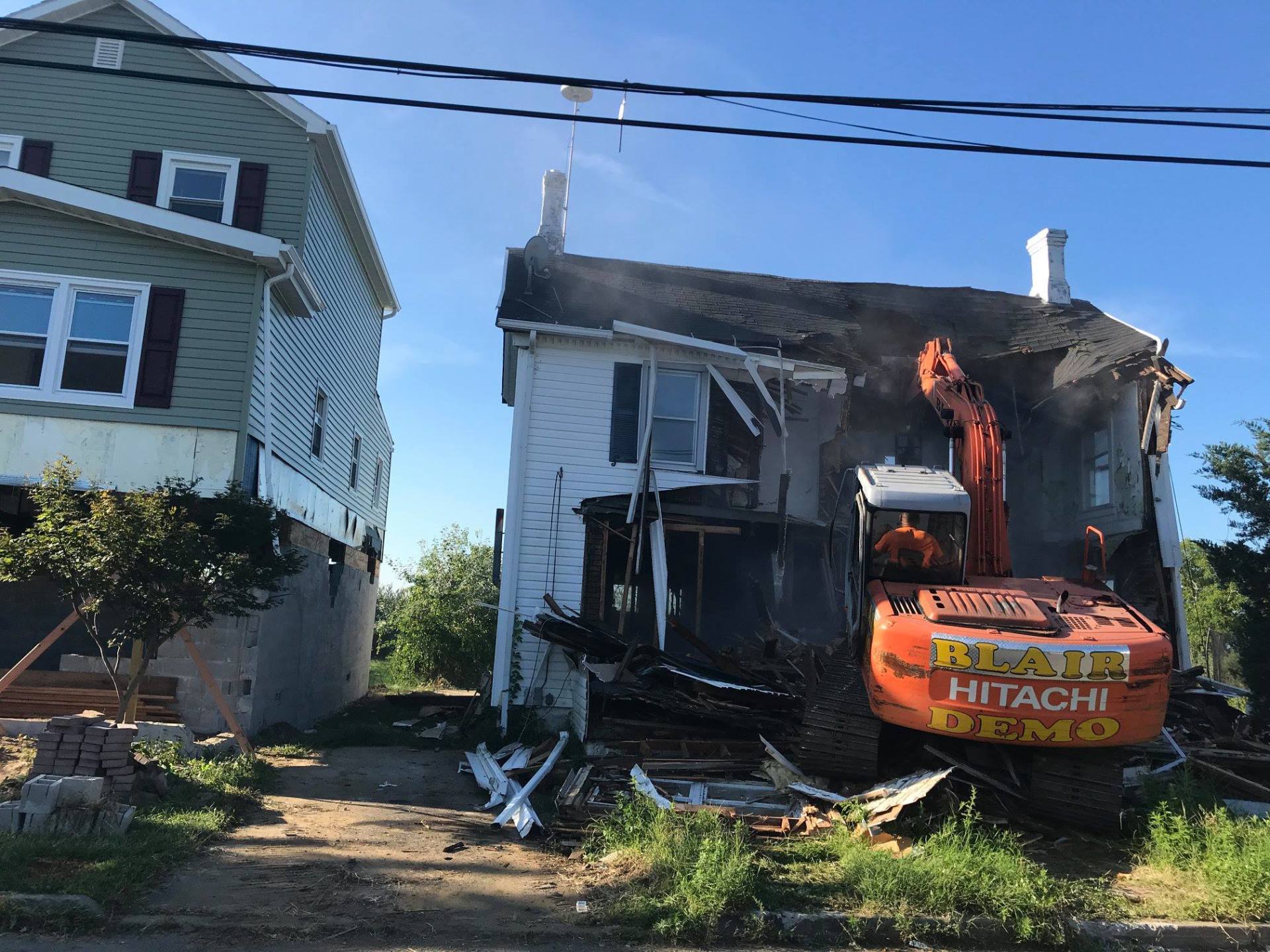 Blair Demolition — Digger Demolishing House in Middletown, NJ