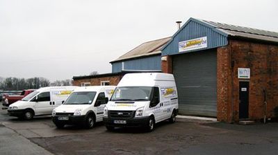 white mobile vans