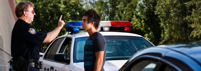 boy in trouble with law officer