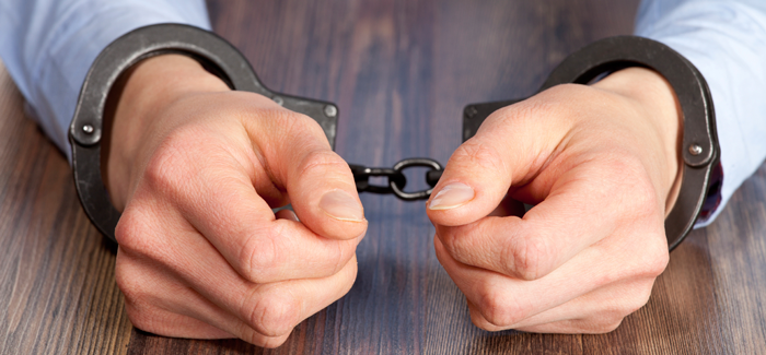 hands in handcuffs