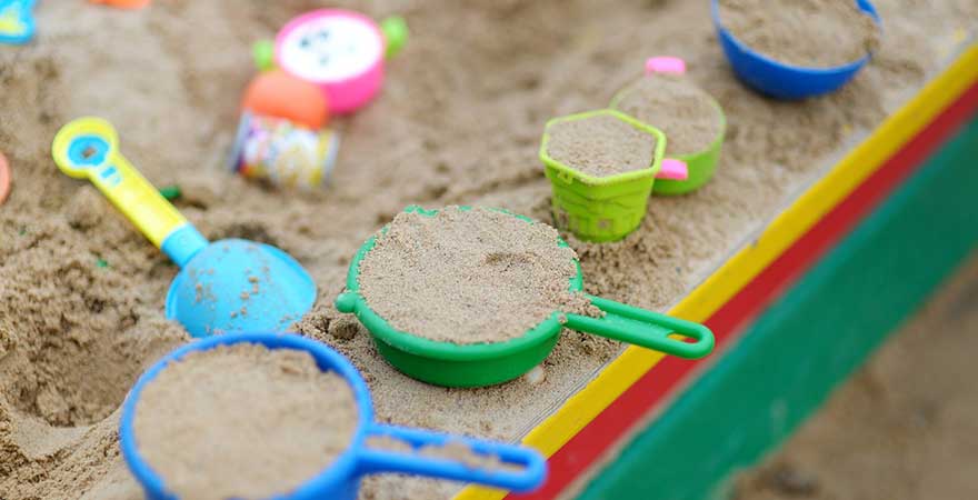 Sand on colored contatiners