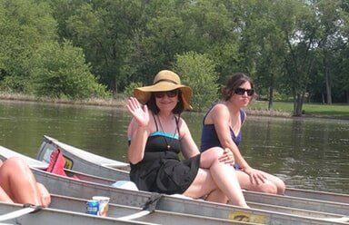 River Tour — Two Woman on Canoe in Kankakee, IL River Tour — Two Woman on Canoe in Kankakee, IL