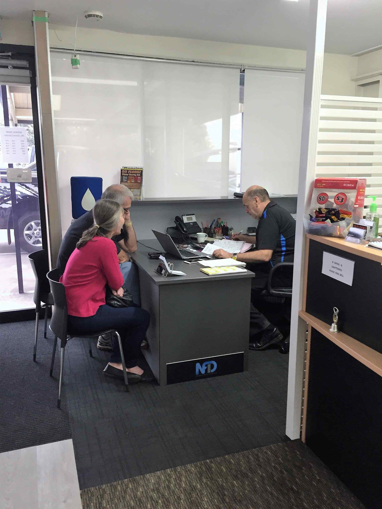 three people talking