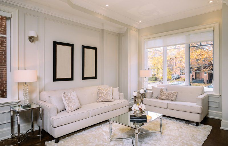 A high end interior living room with white and black interior design